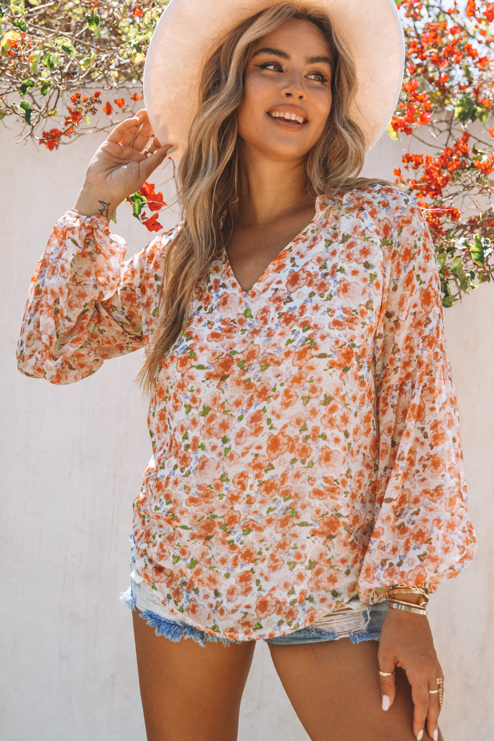 Floral V-Neck Curved Hem Blouse