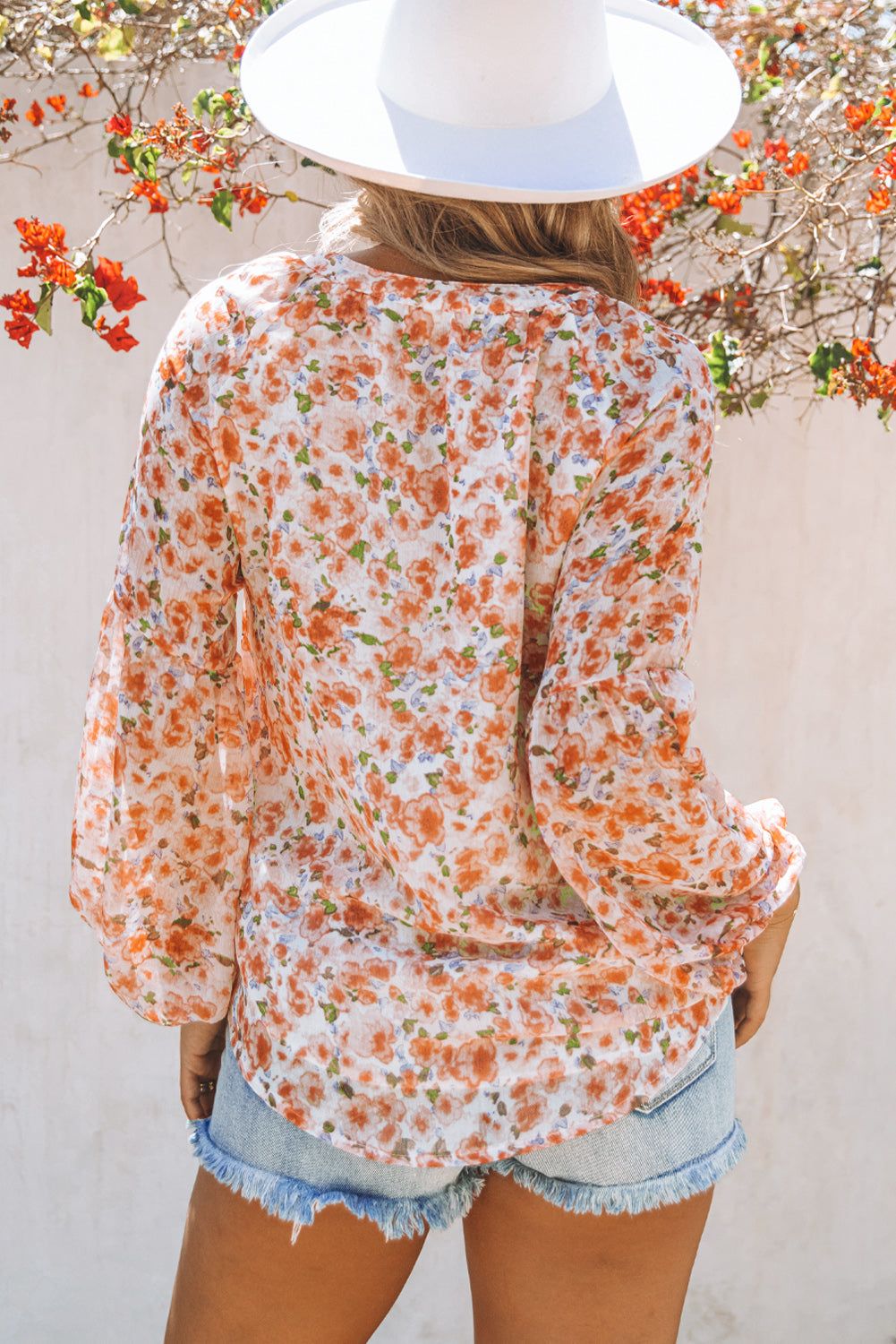 Floral V-Neck Curved Hem Blouse