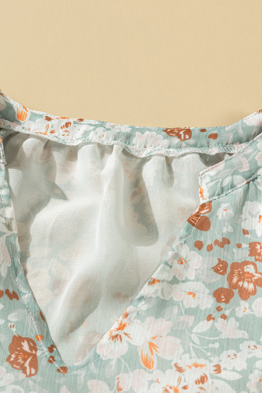 Floral V-Neck Curved Hem Blouse