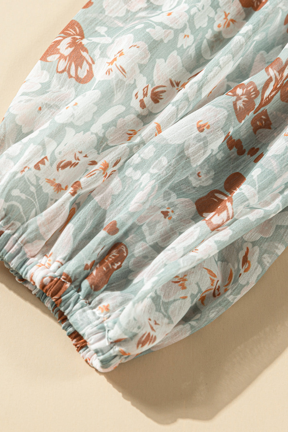 Floral V-Neck Curved Hem Blouse