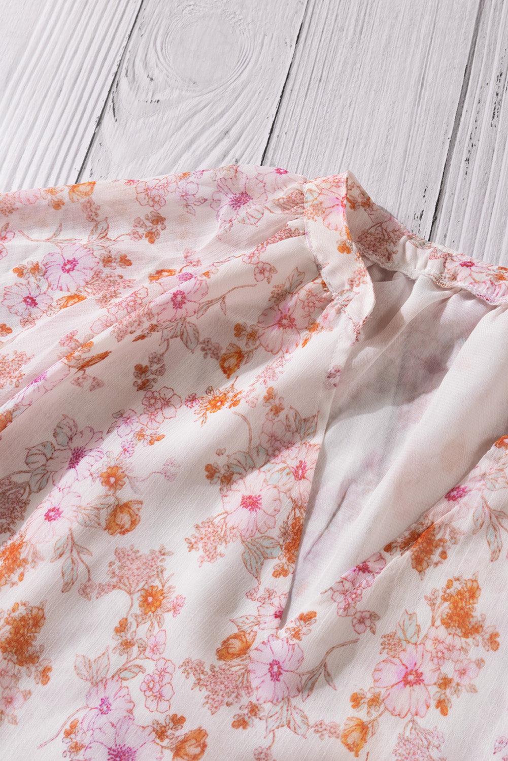 Floral V-Neck Curved Hem Blouse