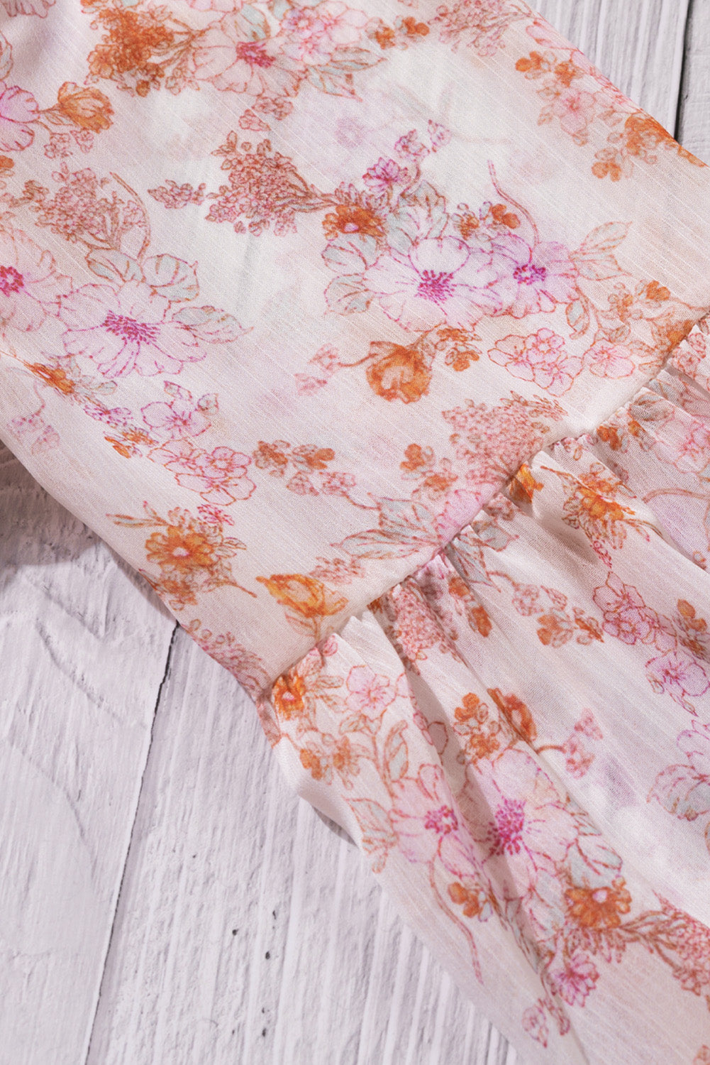 Floral V-Neck Curved Hem Blouse