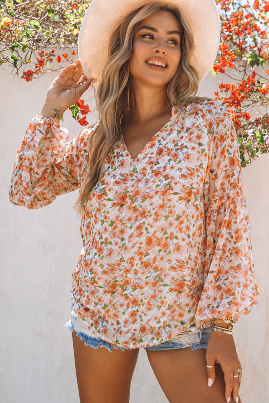 Floral V-Neck Curved Hem Blouse