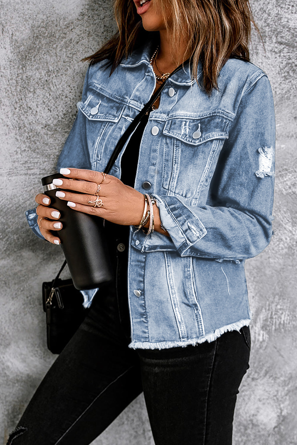 Distressed blue denim on sale jacket